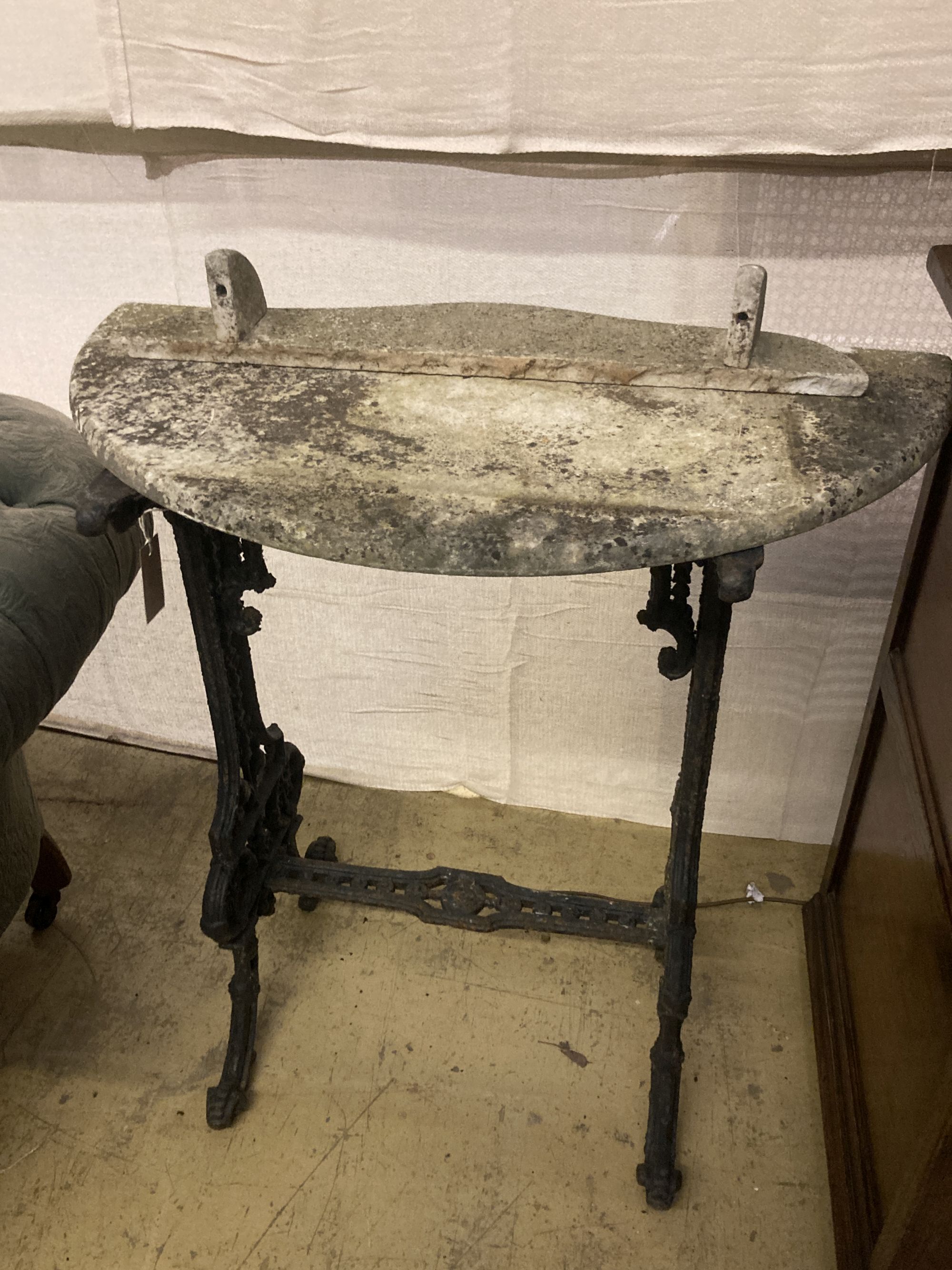 A Victorian cast iron marble top D shape table, width 76cm depth 39cm height 76cm